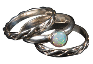 In Mix and Match Stacking Rings, learn to shape wire and solder it in a round shape, set a stone in a bezel cup, and solder a bezel to a ring.